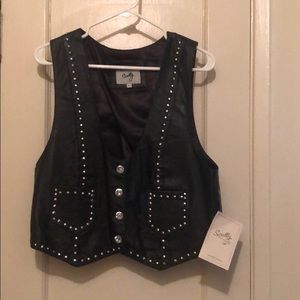 Leather vest with embellishments